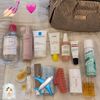 Travel days are so much less stressful when I have all my favorites with me! ✈️🩷: Photo 1 of 1